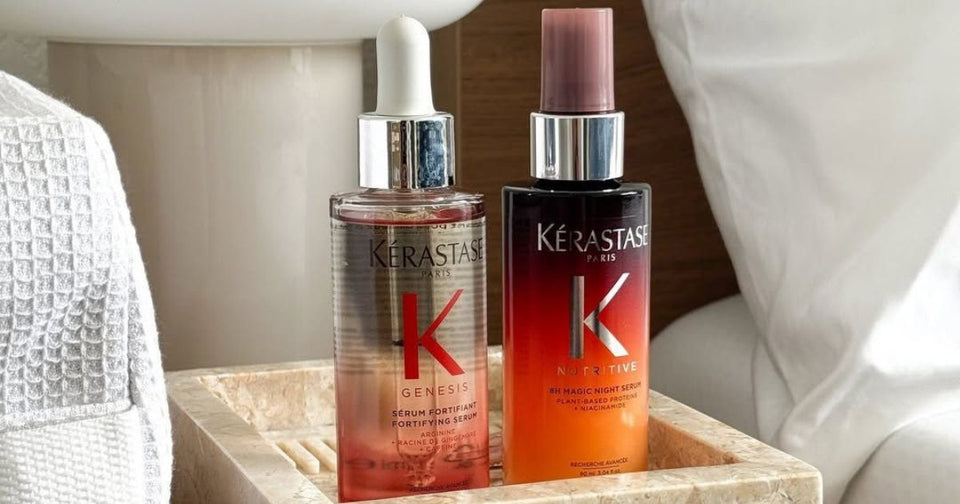 Kérastase scalp serum lineup — Genesis Serum Fortifiant, Spray Stimuliste, Serum Jeunesse, Cure Densifique, Initialiste and Symbiose Night Serum displayed together at Zennkai Vancouver