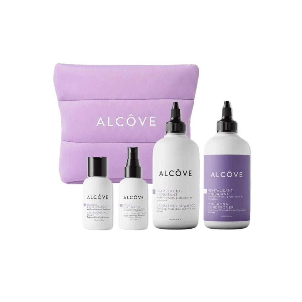Alcôve Daily Holiday Kit — 4-piece everyday haircare gift set with blue cosmetic bag