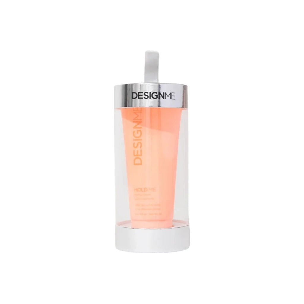 DESIGNME Hold.Me Styling Cream travel size in a clear hanging holiday ornament tube