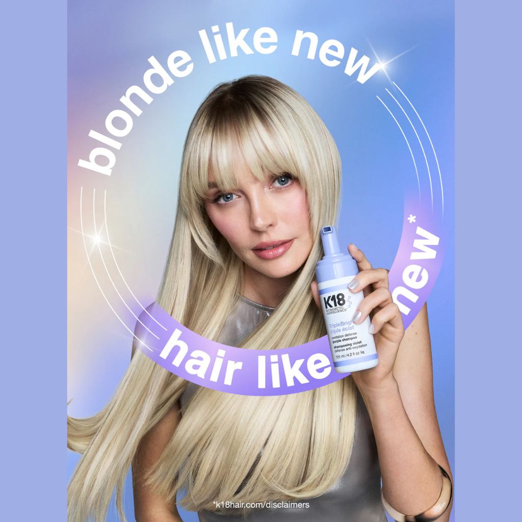 Model with bright, vibrant blonde hair after using K18 TripleBright Oxidation Defense Purple Shampoo