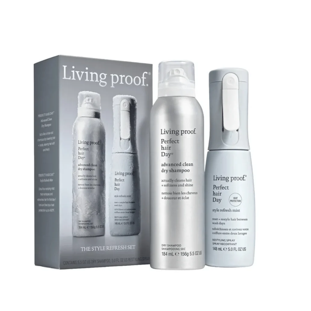 Living proof The Style Refresh Set hair care kit, including a gray outer box and three silver and white bottles: advanced clean dry shampoo, volumizing dry shampoo, and style refresh mist, on a white background.