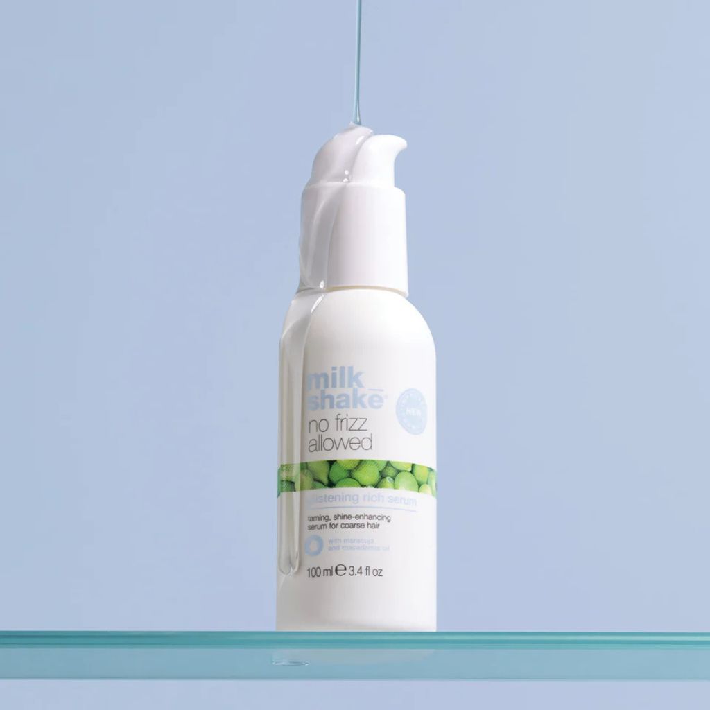 Milkshake No Frizz Allowed Glistening Rich Serum for Frizzy Coarse, Thick Hair Product dripping on bottle - Zennkai